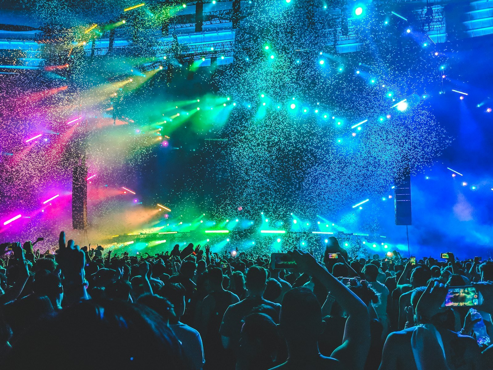 Placeholder — rooftop stage under violet light